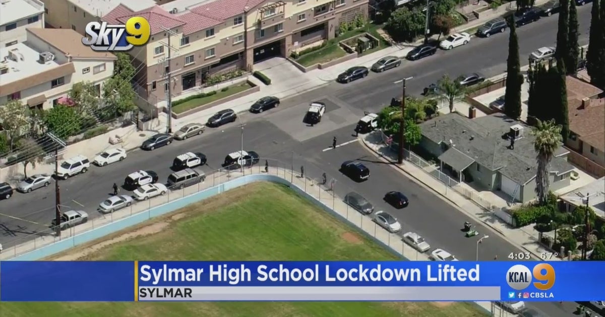 Suspect In Custody After Reports Of Man With Rifle Prompted Lockdown Of