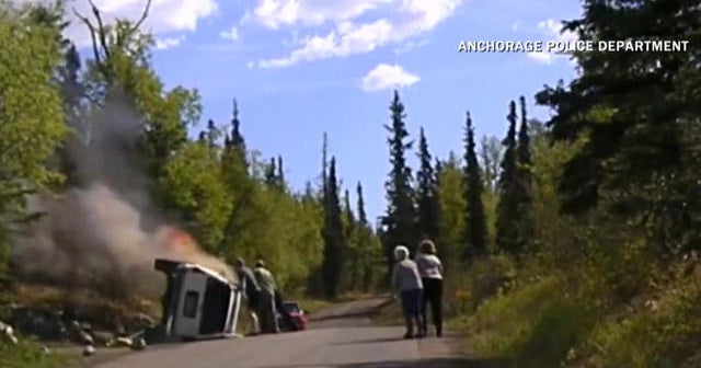 Watch: Life-and-death rescue from fiery car - CBS News