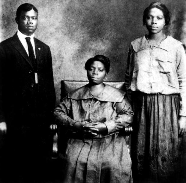 Louis Armstrong (1900-1971) american jazzman trumpet player and singer with mother and sister Beatrice in New Orleans in 1921 