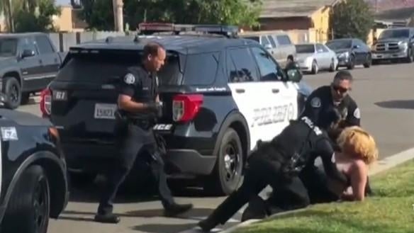 westminster-california-los-angeles-area-cop-punshes-handcuffed-woman-042221.jpg 