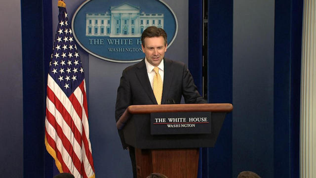 Obama surprises, thanks WH press secretary Josh Earnest during