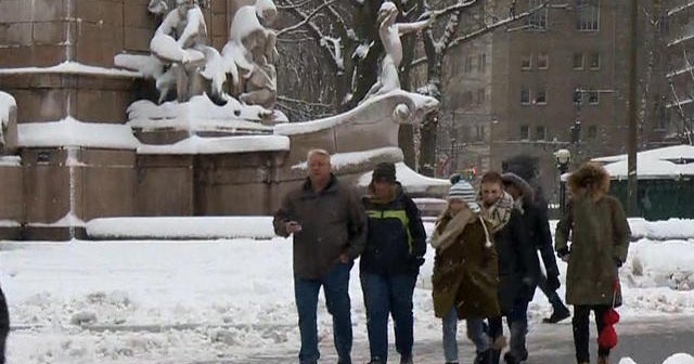 New York digging out from heavy snowfall - CBS News