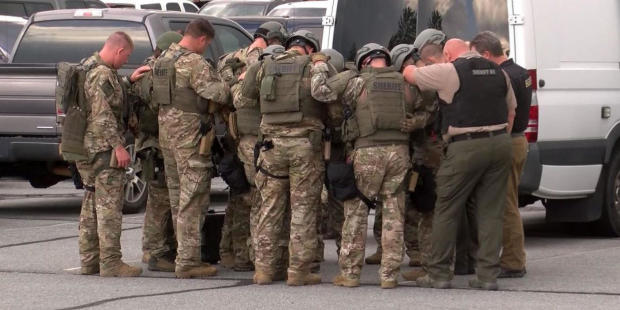 Sheriff's deputies are seen during a standoff in Boone, North Carolina, April 28, 2021. 