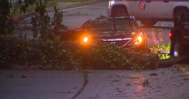 Teenage girl dies in car during violent storm - CBS News