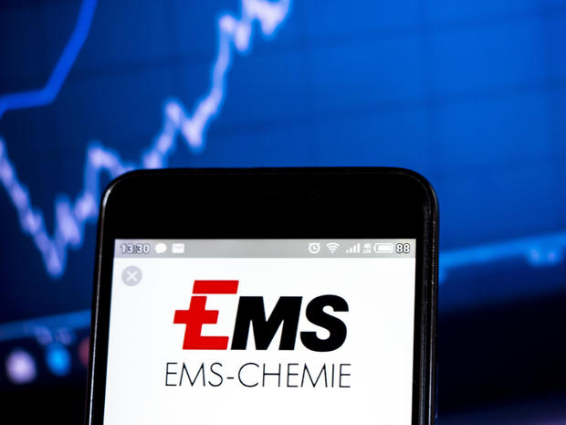 In this photo illustration a  Ems-Chemie Holding logo seen 