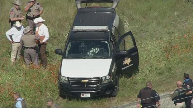 DPS SUV with bullet holes in windshield 