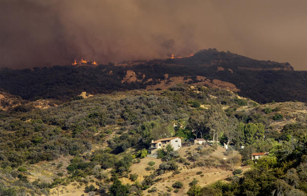 Palisades fire burns above Topanga Canyon Blvd in Los Angeles, CA. 