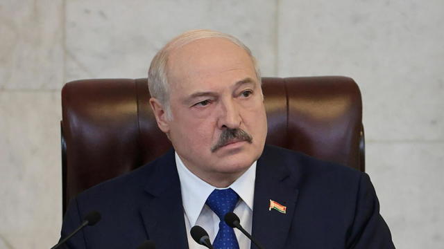 Belarusian President Alexander Lukashenko delivers a speech during a meeting in Minsk 