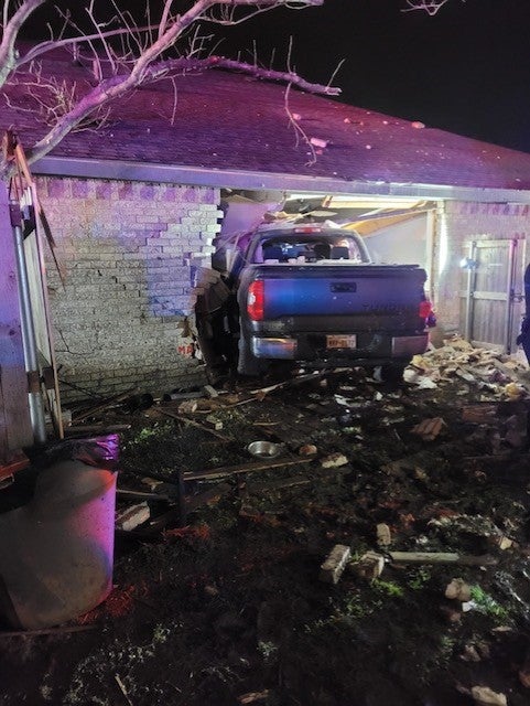Pickup crashes into home in Rowlett 