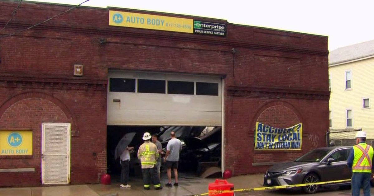 Afternoon Rains Cave In Roof At Somerville Auto Body Shop CBS Boston