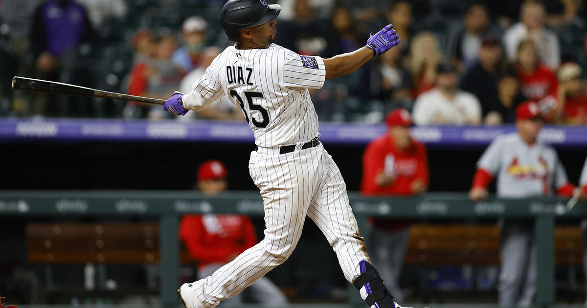 Elias Diaz of the Colorado Rockies celebrates with Brendan Rodgers News  Photo - Getty Images