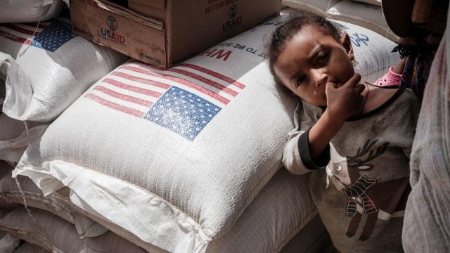 Child in Tigray waits to receive food aid 