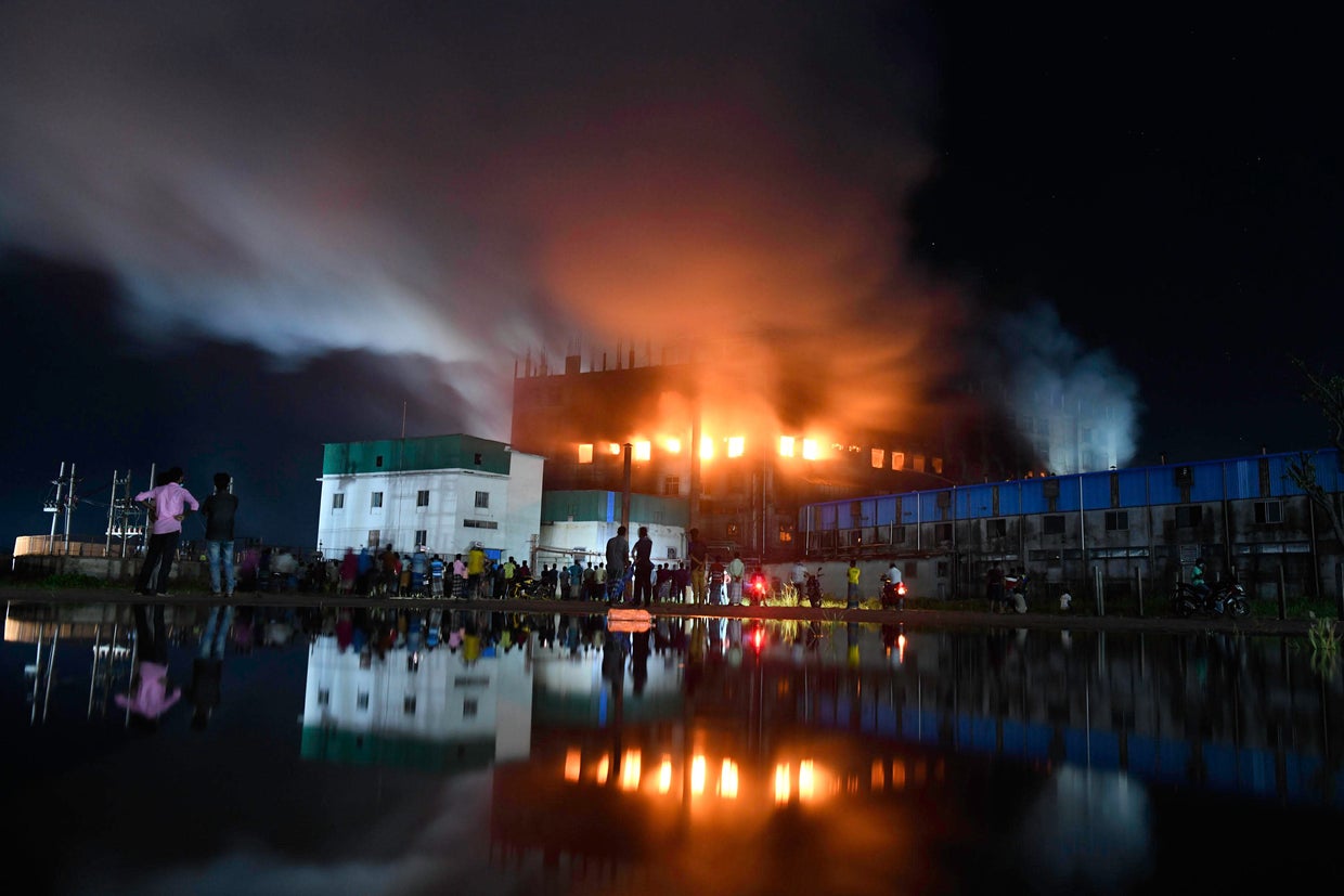 Firefighters try to extinguish fire inside the building 