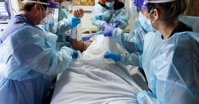 Health care workers describe burnout and prolonged stress of dealing with COVID-19 - CBS News