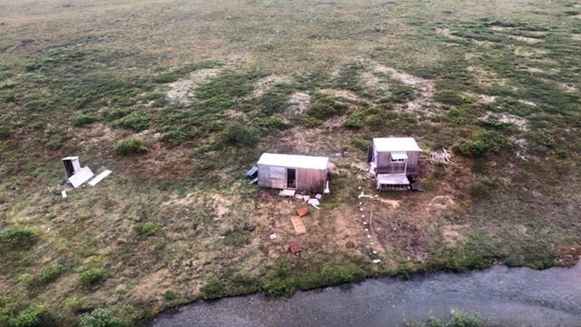 An aerial photo shows a remote mining camp near Nome, Alaska, where a U.S. Coast Guard helicopter crew rescued a survivor of a bear attack July 16, 2021. 