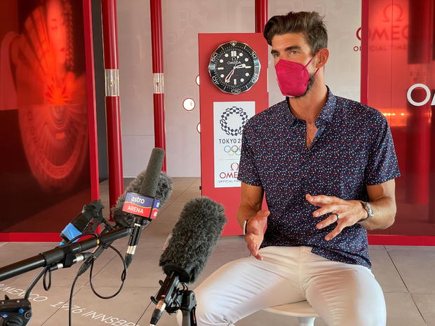 U.S. Olympic gold medalist in swimming Michael Phelps attends an interview in Tokyo 