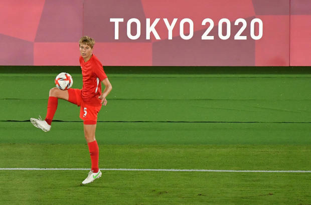 Canada's midfielder Quinn warms up prior to the Tokyo Olympic Games women's final soccer match between Sweden and Canada at the International Stadium Yokohama in Yokohama, Japan, on August 6, 2021. 