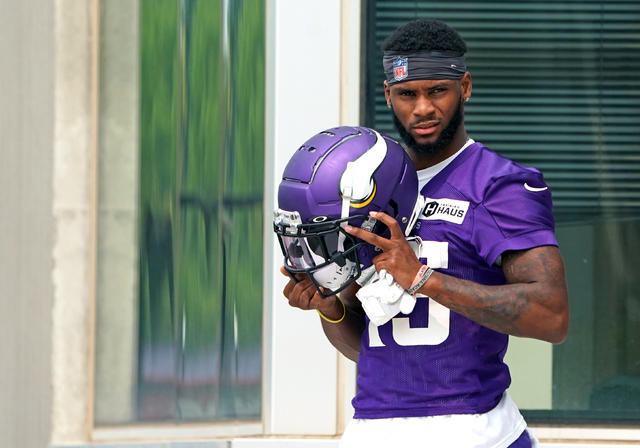 Minnesota Vikings wide receiver Ihmir Smith-Marsette (15) is lying