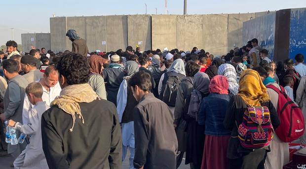 People continue to wait around Kabul's Hamid Karzai Airport âââââââ 