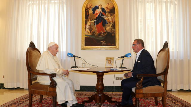 Pope Francis speaks during an interview with Spanish radio station COPE at the Vatican City 