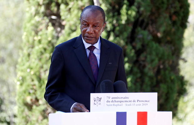 FILE PHOTO: Guinean President Alpha Conde delivers a speech 