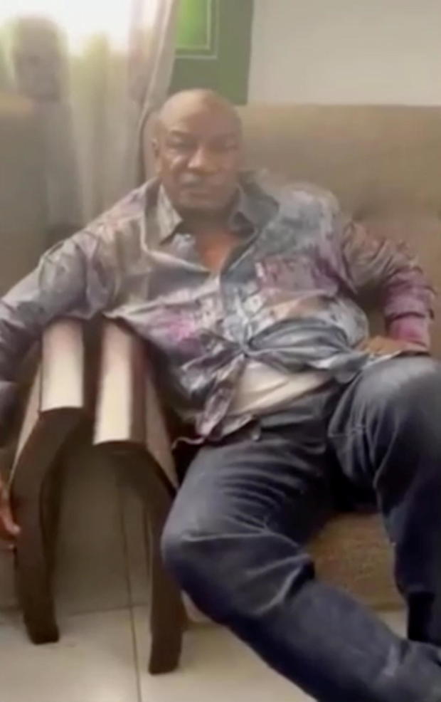 A screen grab from a video shared on social media, but not yet authenticated, claimed to show Guinea's President Alpha Conde detained by army special forces, in Conakry 