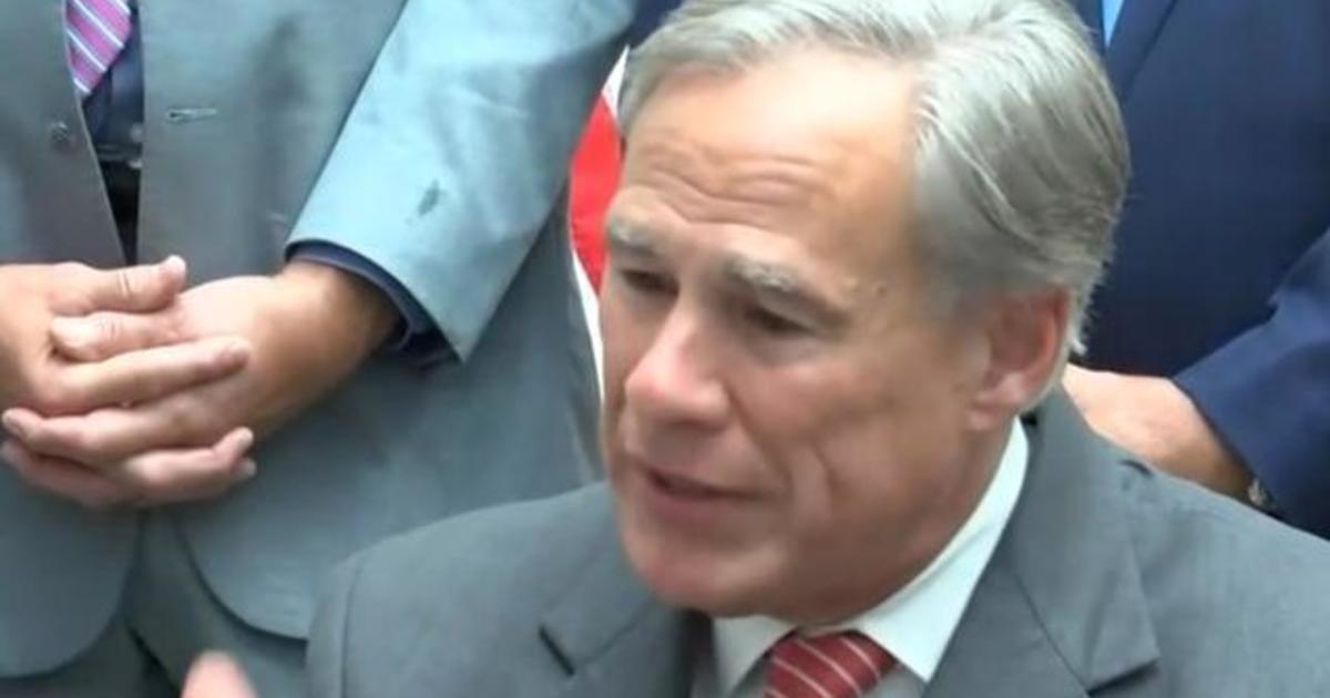 Texas Governor Greg Abbott Signs Election Bill Into Law - CBS News