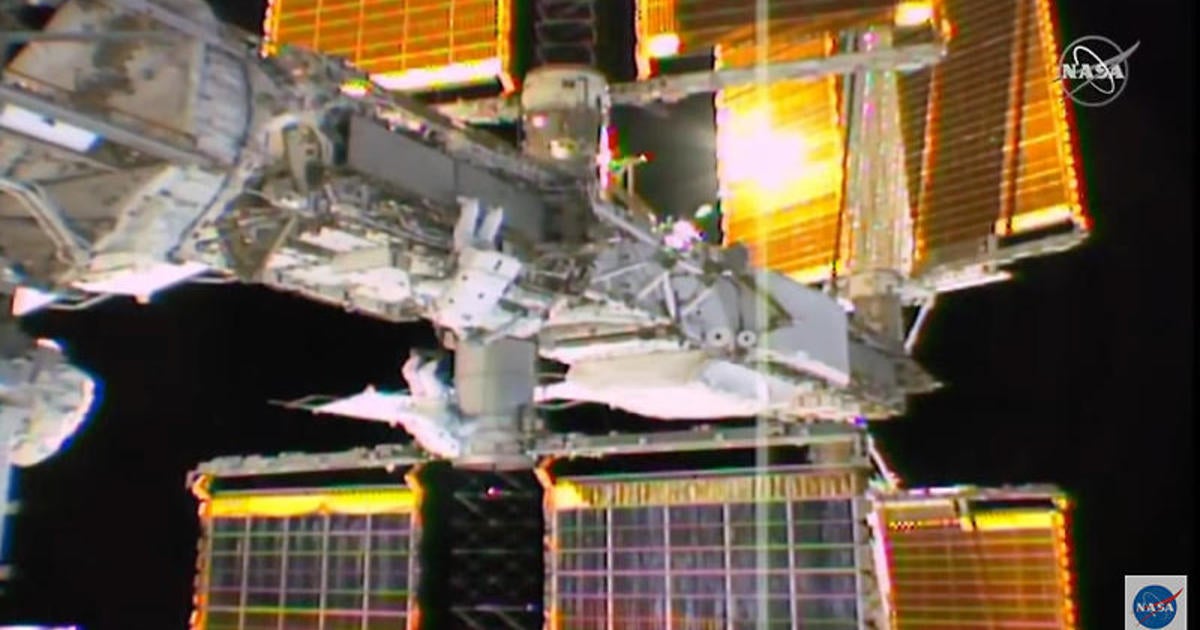 Spacewalkers carry out space station power system upgrades - CBS News