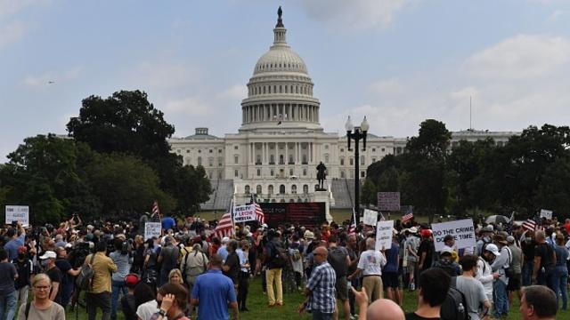 cbsn-fusion-large-police-presence-at-justice-for-j6-rally-at-us-capitol-thumbnail-795540-640x360.jpg 