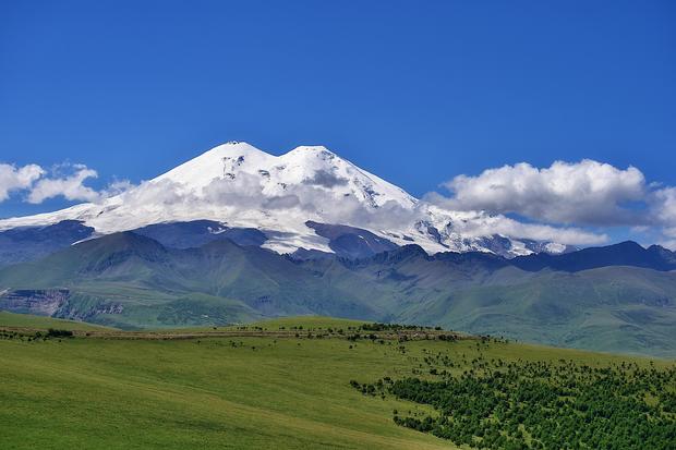 Elbrus Mountain. Scenic View Of Snowcapped Mountains Against Sky 