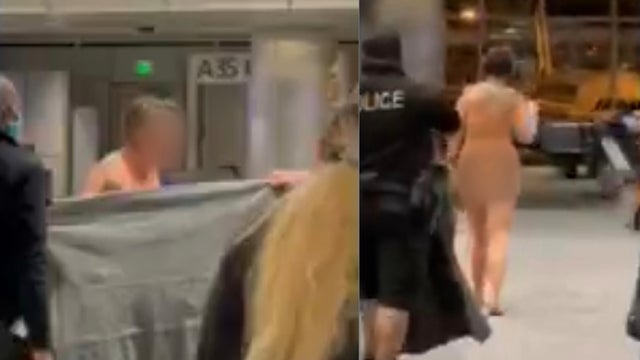 denver-international-airport-naked-woman.jpg 