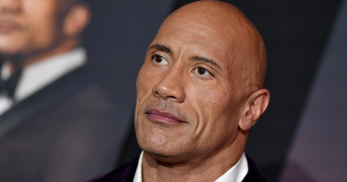 Dwayne The Rock Johnson says his production company will stop using real  guns after deadly Rust shooting - CBS News