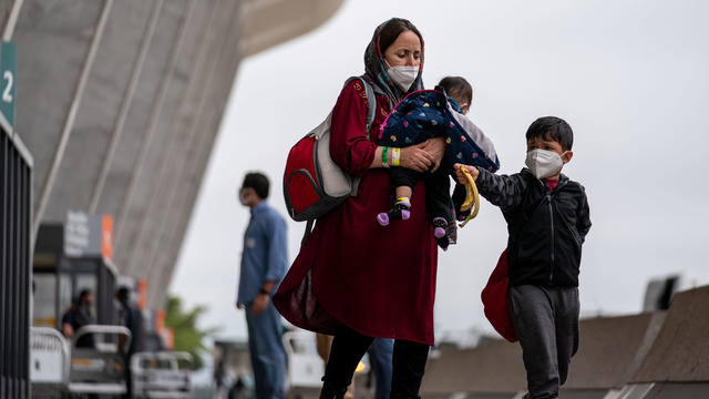 Afghanistan Refugees Arrive at Dulles International Airport 