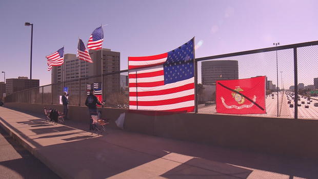 FLAGS ON OVERPASS 5VO.transfer_frame_61 