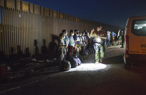 Asylum seekers cross the Arizona border 