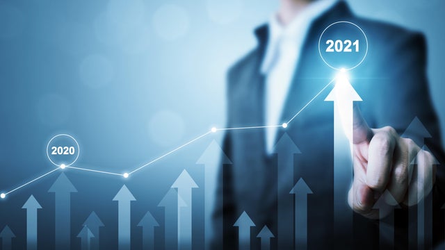 Businessman pointing arrow graph corporate future growth plan. Business development to success and growing growth year 2020 to 2021 concept 