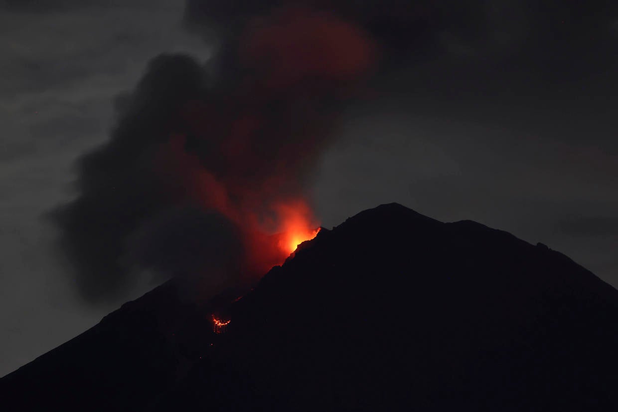 At least 34 killed in Indonesia volcano eruption as rain and lava ...