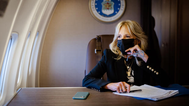 First lady Jill Biden grades papers for her classes at Northern Virginia Community College as she travels to Washington, Sept. 15, 2021. (Erin Schaff/The New York Times) 