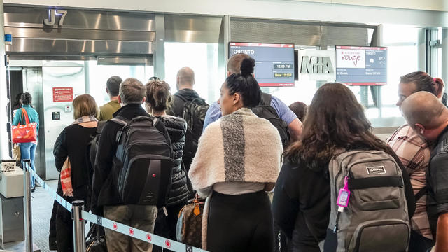 Miami International Airport, Air Canada, departing flight crowded gate 
