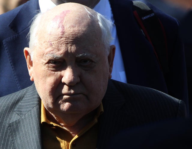 Russian President Vladimir Putin and Israel Prime Minister Benjamin Netanyahu watch the Red Square military parade 