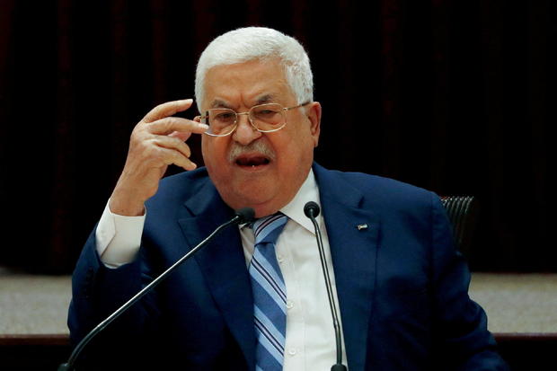 FILE PHOTO: President Mahmoud Abbas gestures during a meeting in Ramallah 