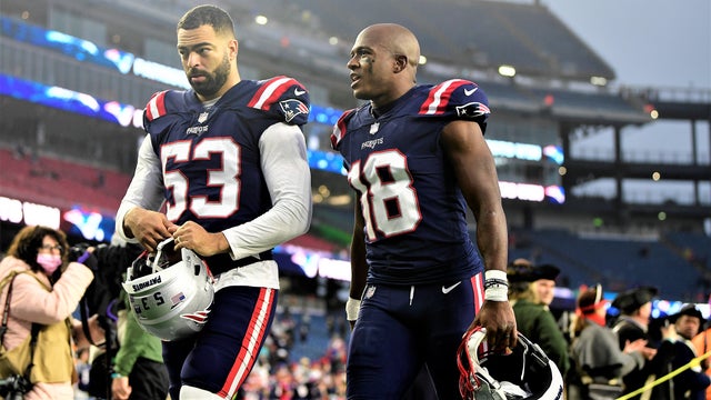 Matthew Slater walks off the field with Kyle Van Noy after the Patriots beat the Jaguars.