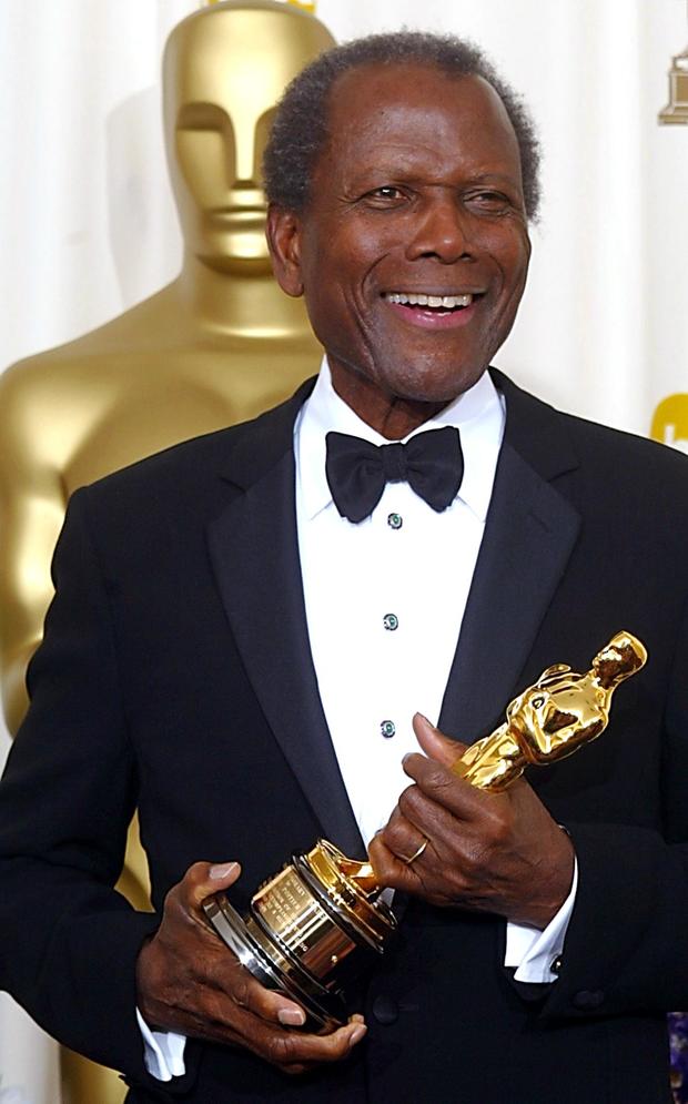 US actor Sidney Poitier hold his honorary Oscar 24 