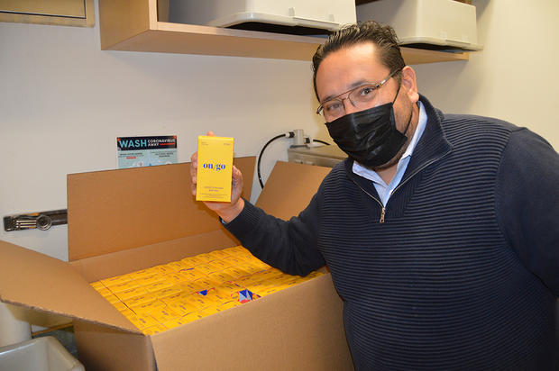 Dr Cesar Morales with Test Kits 