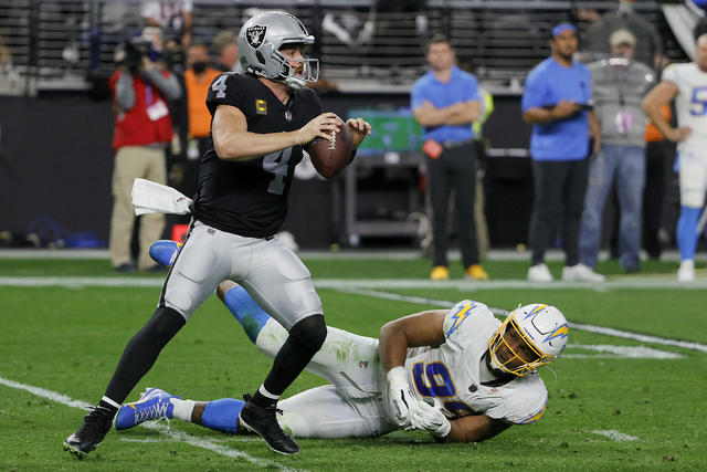 Man sent tumbling downstairs during epic fan 'boxing match' at Chargers vs  Raiders game