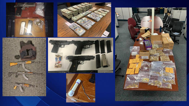 FBI-gang-raids-weapons-drugs-cash.jpg 