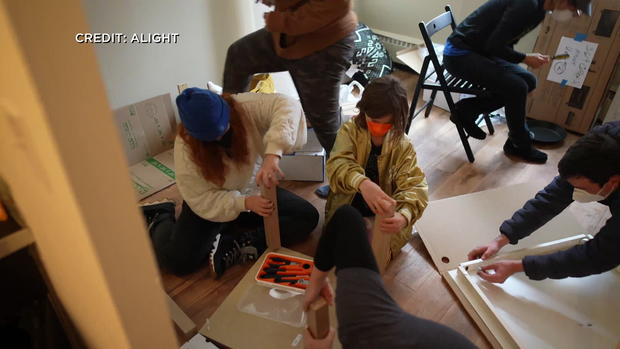 Alight volunteers set up apartment for Afghan refugees 