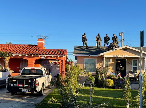 SWAT Standoff With Man On Roof Of Walnut Park Home 