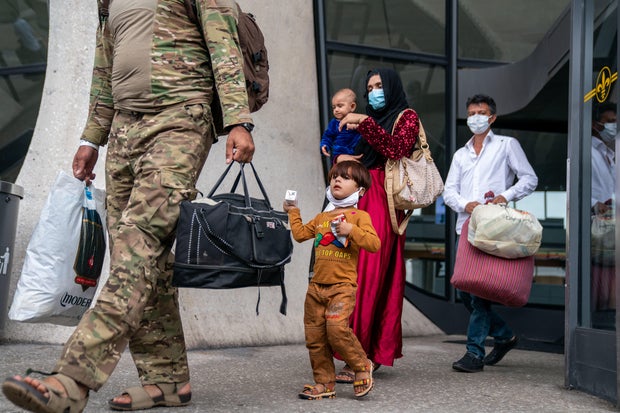 Afghanistan Refugees Arrive at Dulles International Airport