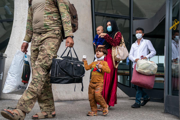 Afghanistan Refugees Arrive at Dulles International Airport 